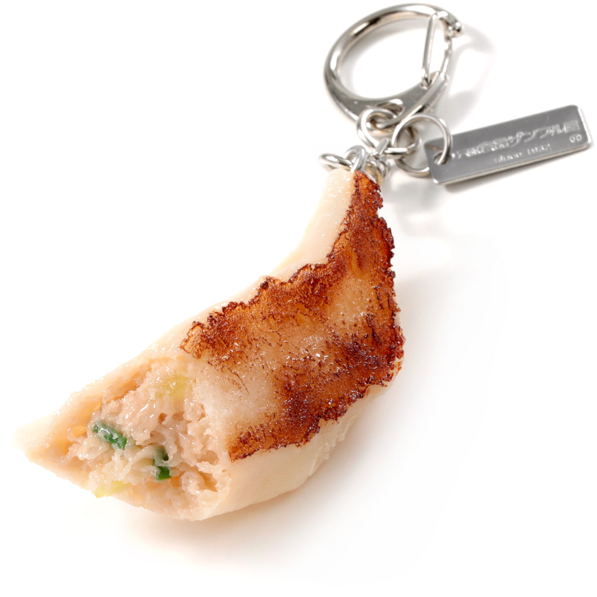 これは元祖食品サンプル屋「キーリング 焼き餃子カット」の商品画像です。