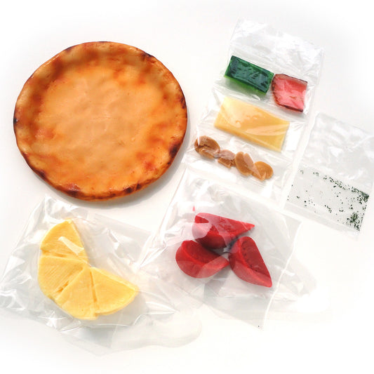 これは自分でつくる食品サンプルキット「さんぷるんVol.3 ミックスピ」の内容物写真です。