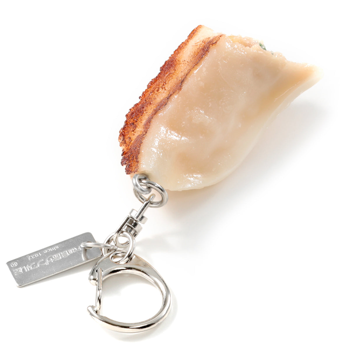 これは元祖食品サンプル屋「キーリング 焼き餃子カット」の裏面の商品画像です。