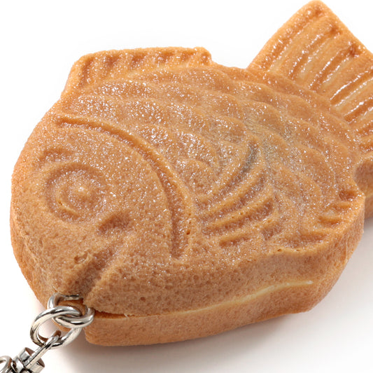 これは元祖食品サンプル屋の「キーリング スマイルたい焼」の商品アップ画像です。