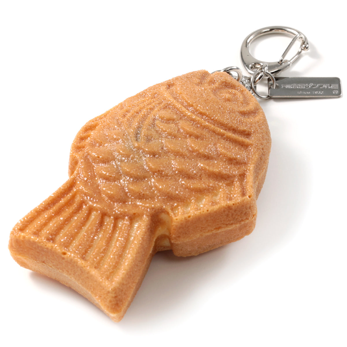 これは元祖食品サンプル屋の「キーリング スマイルたい焼」の商品側面画像です。