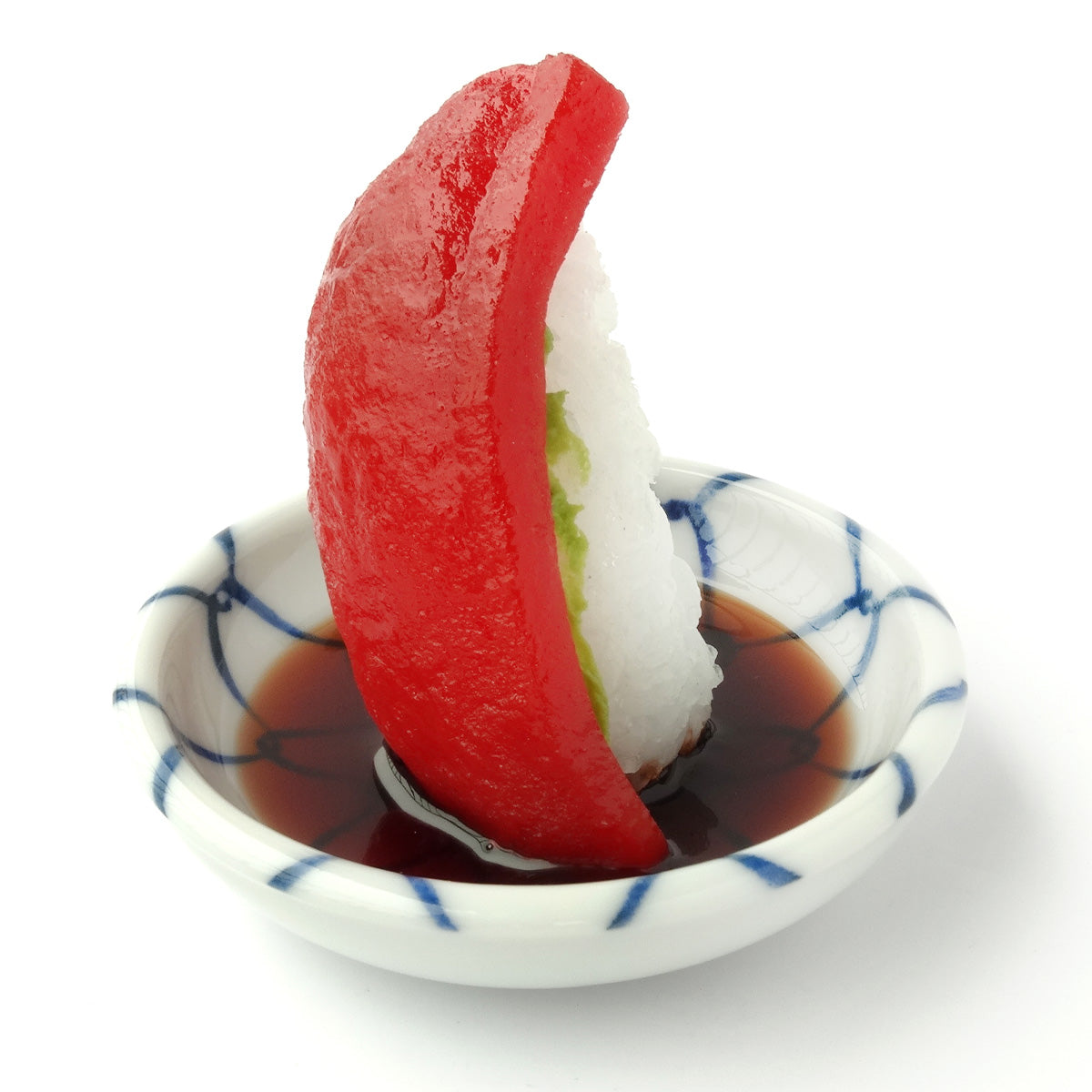 これは元祖食品サンプル屋の「つまみ寿司 マグロ」の商品画像です。