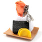 これは元祖食品サンプル屋の「おでかけおにぎり鮭」の商品写真です。