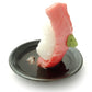 これは元祖食品サンプル屋の「つまみ寿司 中トロ」の斜めカットの商品画像です。