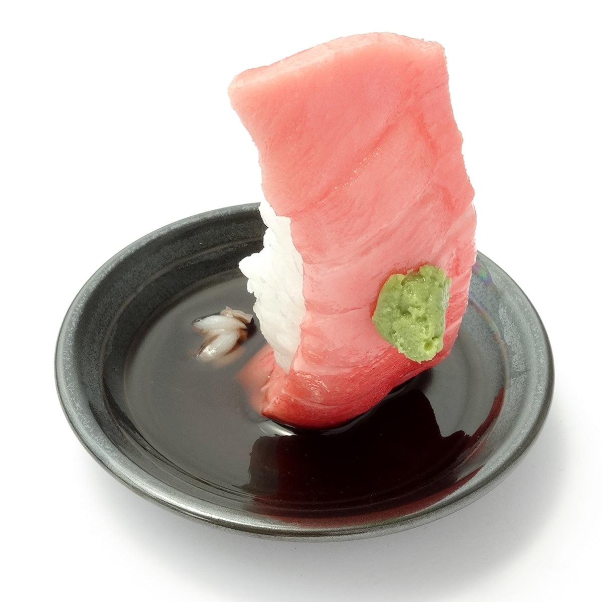 これは元祖食品サンプル屋の「つまみ寿司 中トロ」の商品画像です。